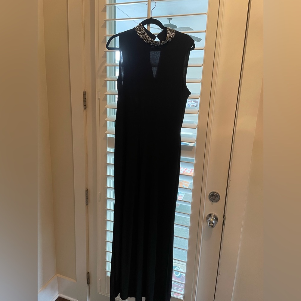 Brand new black jumpsuit.  Tiana B